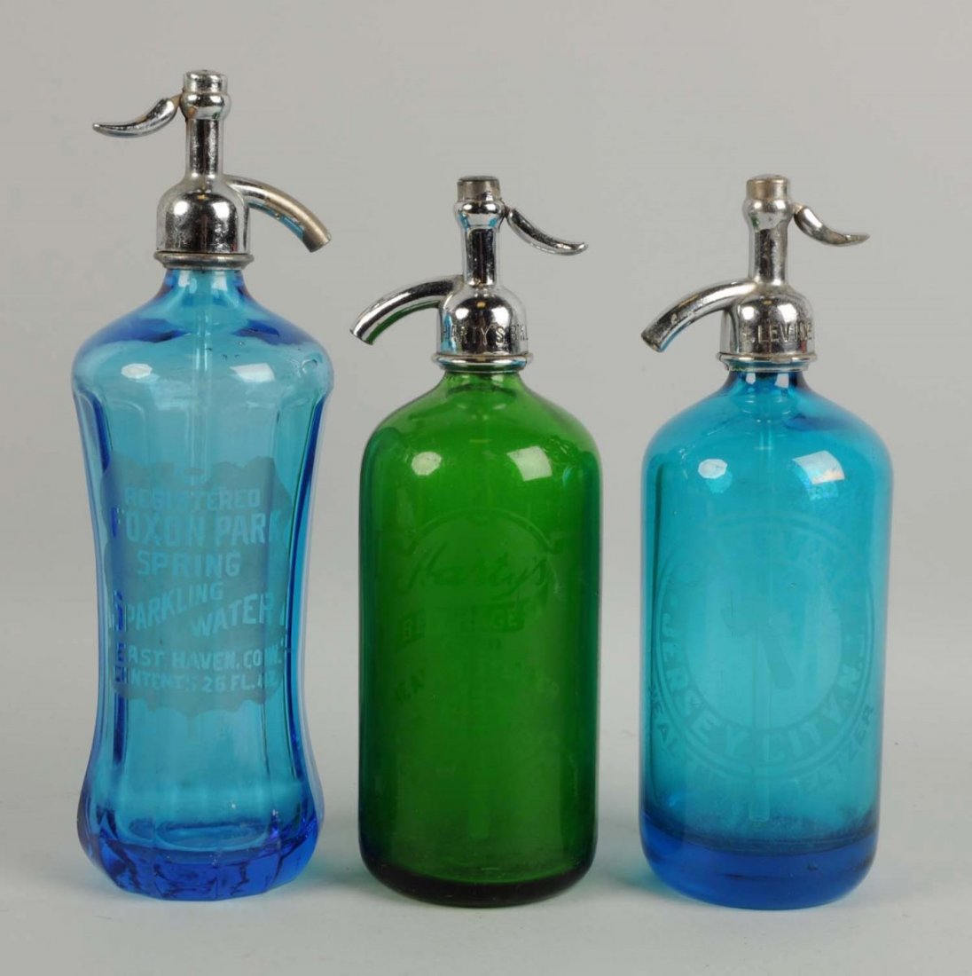 Lot of 3: Glass Seltzer Bottles.: Includes Harty's, Foxon Park and H. Levine. No chips or cracks. Condition (Excellent). Size Largest: 12 - 1/2" T.