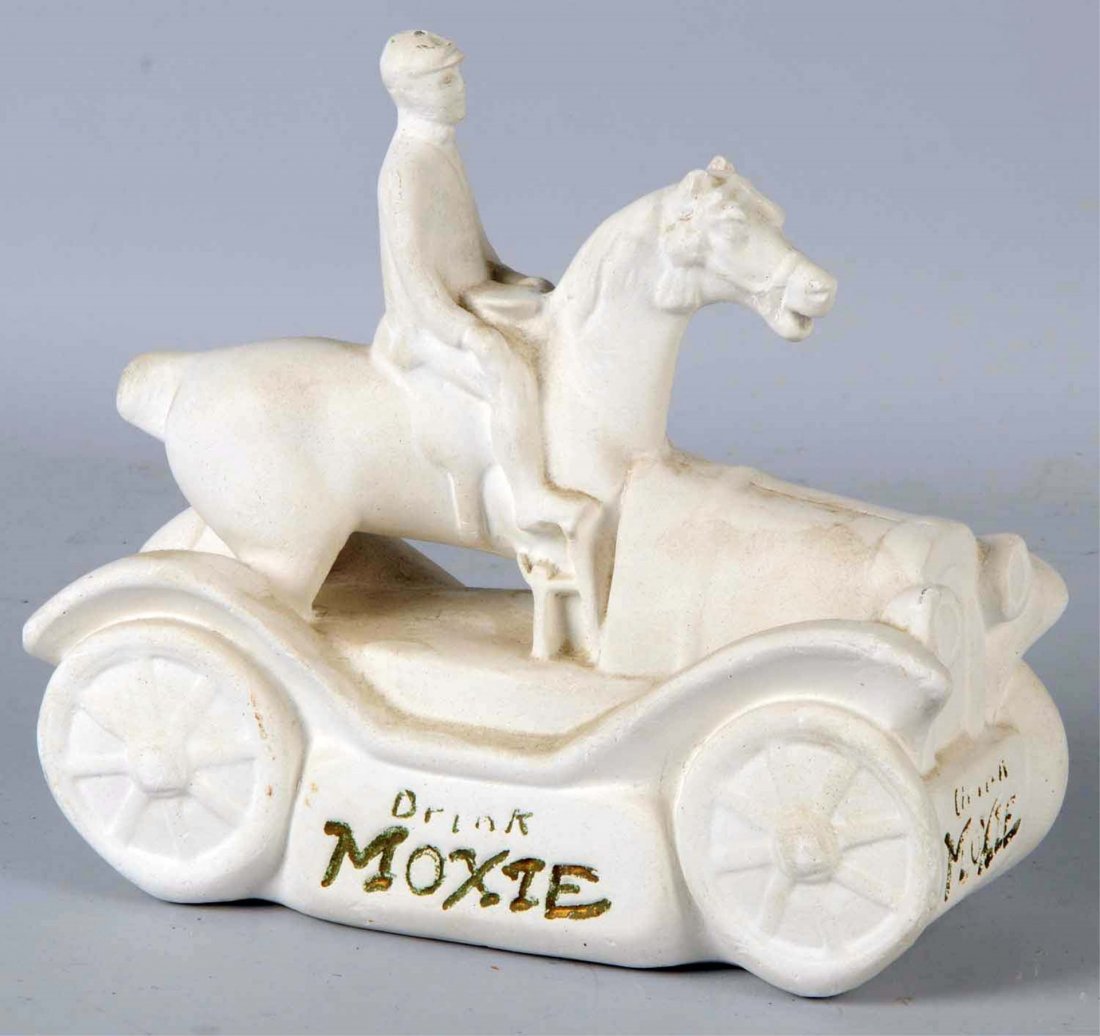 1920s-1930s Moxie Mobile Chalkware Figure.: A very neat item with light soiling and wear. Condition (Excellent). Size 9" L.