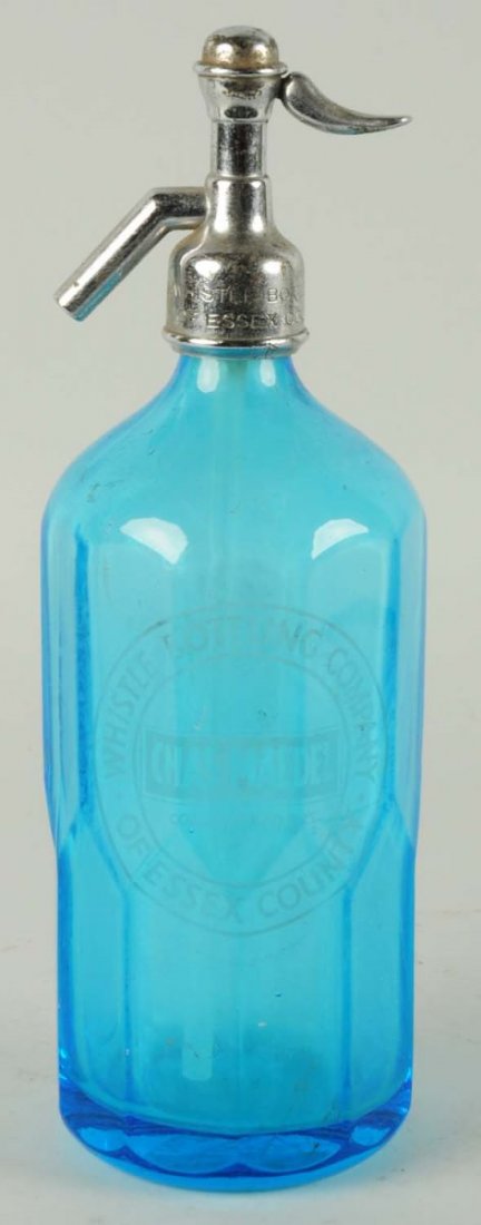Whistle Blue Fluted Bottle.: Some chips and nicks with light wear. Condition (Very Good - Excellent). Size 12 - 1/4" T.