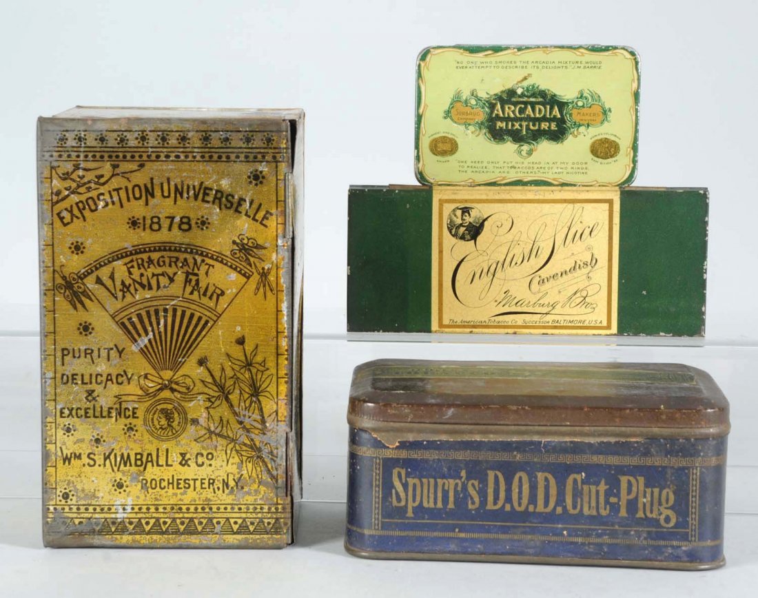 Lot of 4: Vintage Tobacco Tins.: Vanity Fair upright (Wm. S. Kimball), Fragrant, D.O D Cut Plug (ripped paper label) and English Slice Cavendish (Marburg Bros. Tob. Co.), and Arcadia Mixture (Surburg Co.). Condition (Good Plus). Size