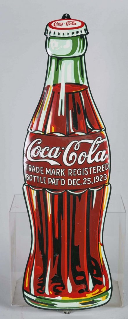 Tall Coca Cola Embossed Die-Cut Litho Tin Sign: Featuring the Christmas Coke bottle circa 1932, marked "American Art Works Coshocton, Ohio 1932" Condition (Excellent). Size 11" x 39"