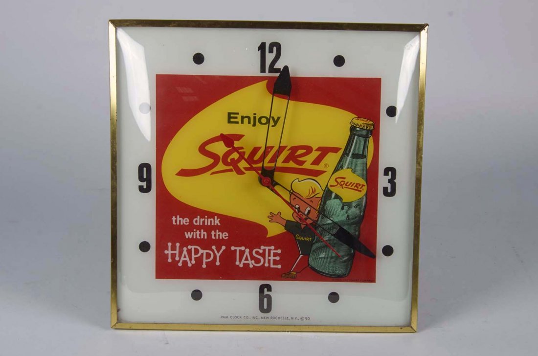Squirt Soda Illuminated Square Clock: Enjoy Squirt, the drink with the happy taste." Manufactured by the Pam Clock Co. circa 1960s. Condition (Excellent). Size 15-1/4" x 15-1/4" x 3