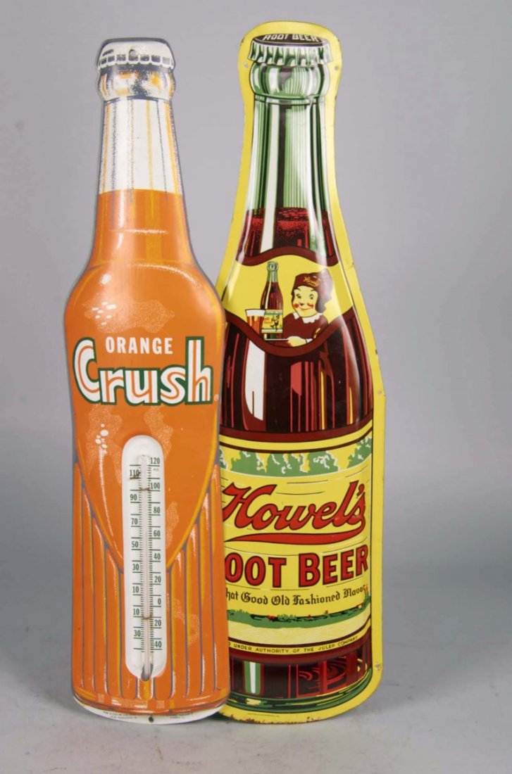 Lot Of 3 Pressed Tin Bottle Advertisement Signs: Including 1 - Orange Crush thermometer - 8.25" x 29.5", 1 - Sun Crest thermometer - 5" x 17" and 1 - Howel's Root Beer "Root Beer with that Good Old Fashioned Taste" - 7" x 28.75" Condition (Very good