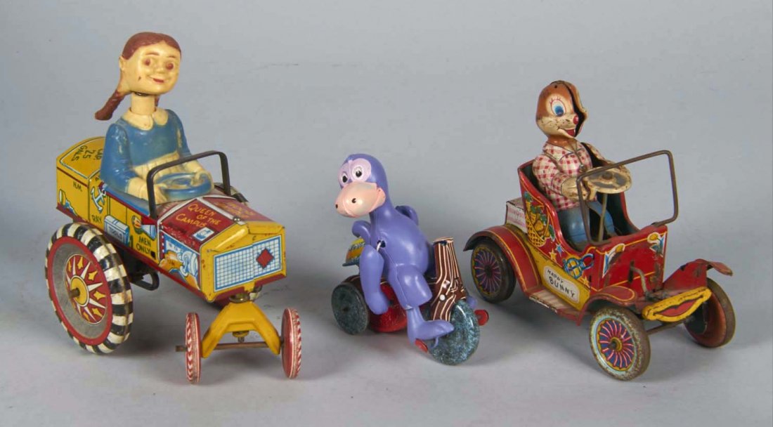 Lot Of 3 Tin Litho Wheeled Toys: Including 1- Marx Japan; 1- Hanna Barbera Flintstones Dinosaur Dino on trike with bell Missing handlebar Works, 1- Marx U.S.A. Queen Of The Campus Tin Wind Up Toy Car with plastic bobble-head queen Wo