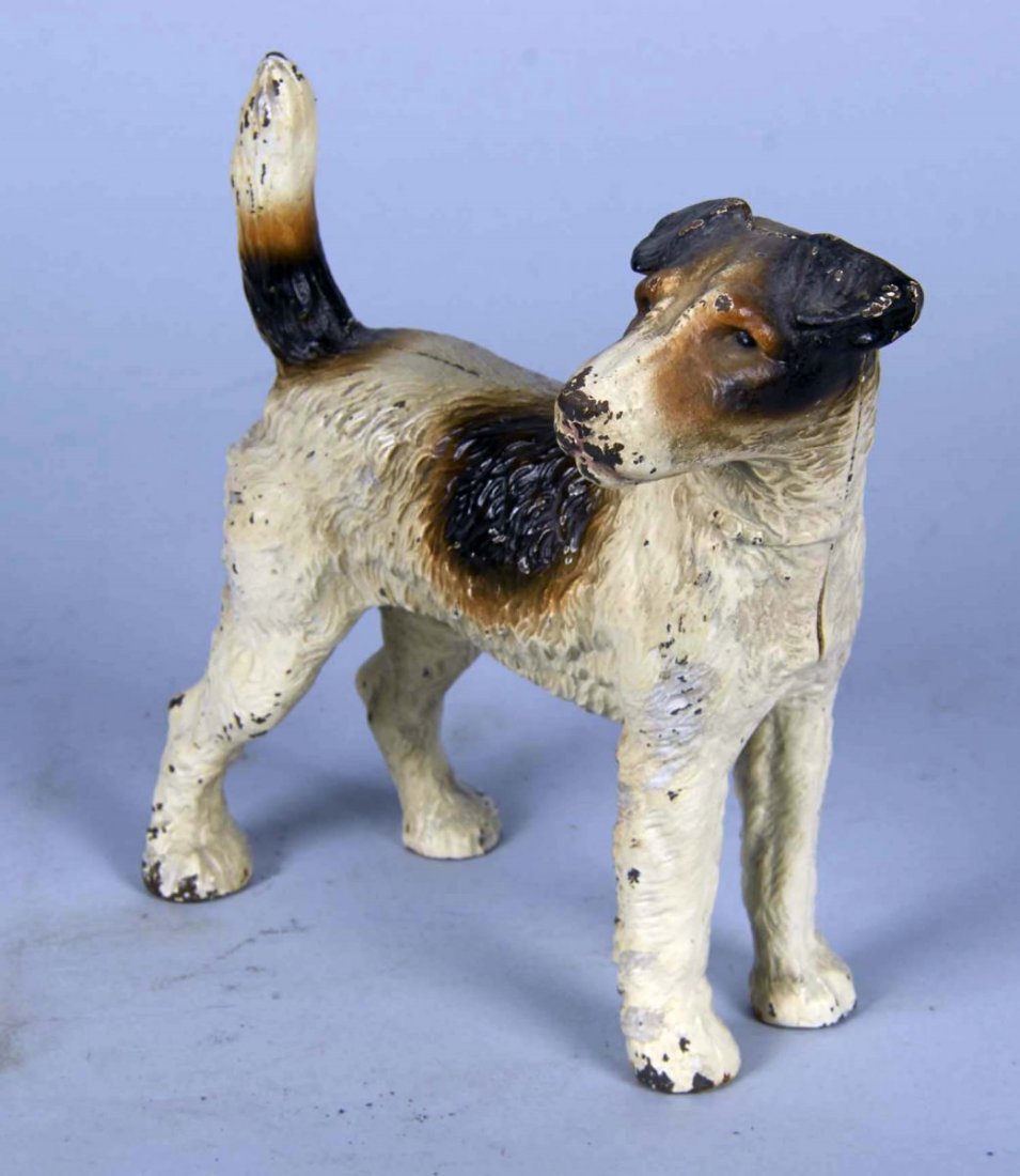 Hubley Cast Iron Fox Terrier Doorstop: Some paint chips throughout. Condition (Very good). Size 8.5" x 7" x 3.5"
