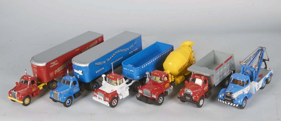 Lot Of 6 First Gear Die-Cast Mack Trucks: 1/34 scale, Including 1 - 1960 Model B-61 dump truck c1996 in box (10-1/2" x 4" x 6"), 1 - R-Model dump trailer c1999 in box (7" x 4" x 14-3/4"), 2 - 1960 Model B-61 tractor & trailer in box (13" x 4"