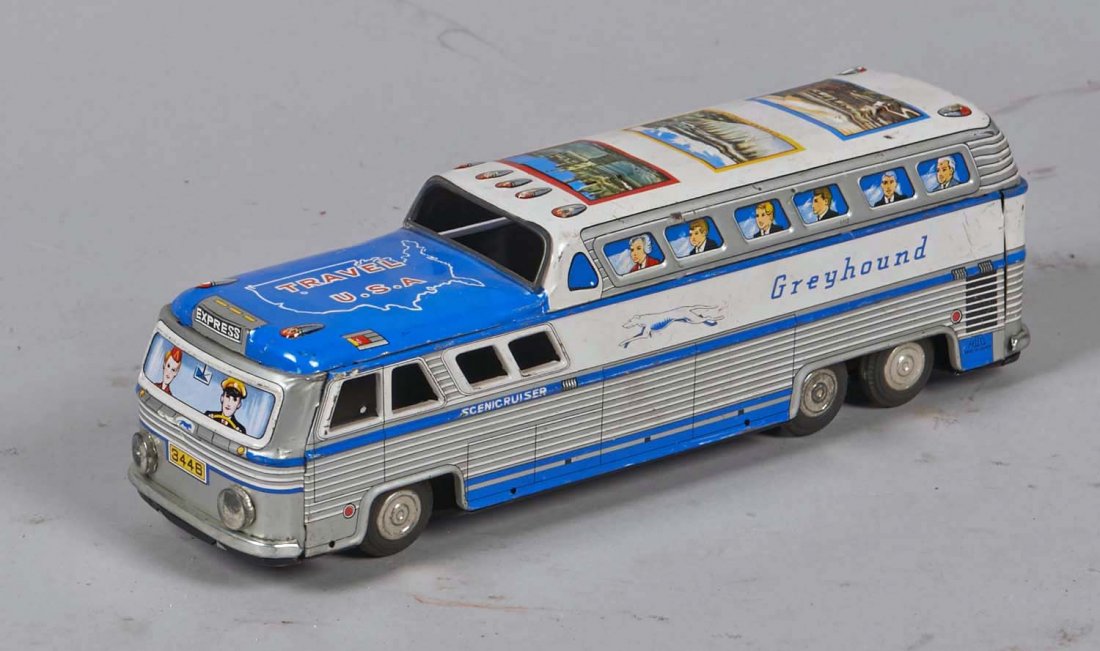 HTC Japan Tin Litho Travel U.S.A. Greyhound Bus: Has New York City, Niagara Falls, and Grand Canyon decals. Condition (Very good). Size 12" x 2-1/2" x 3-3/4"