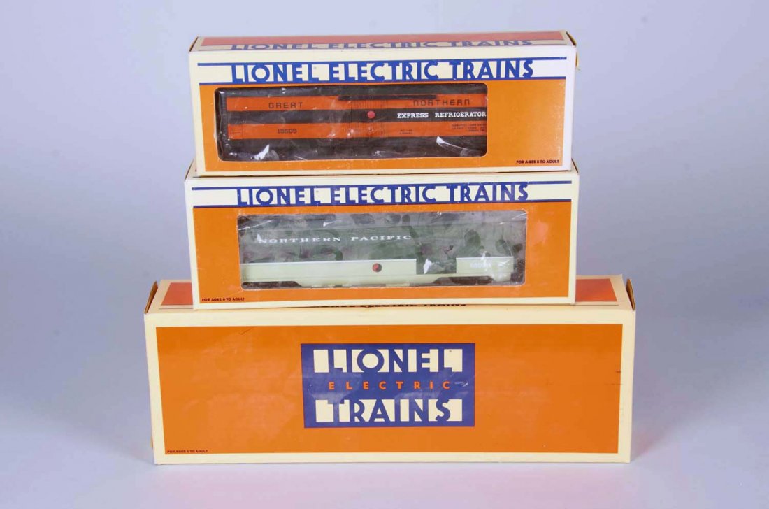 Lionel Electric Great Northern Railway Engine: Plastic no. 8302 in black with yellow and orange striping. New in box circa 1988. Condition (Excellent).