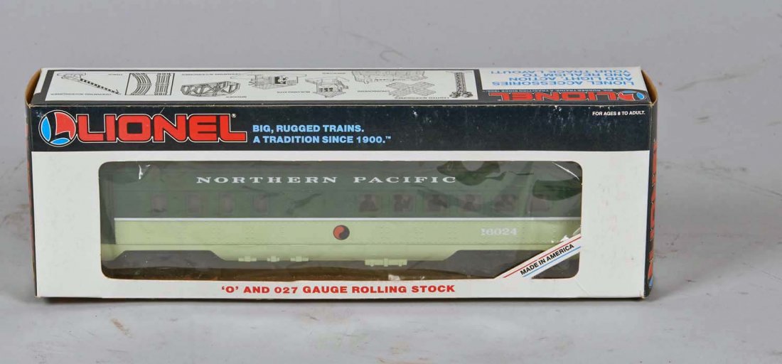 Lionel Electric Northern Pacific Diner Car: No. 6-16024 with illuminated interior and passenger silhouettes in original box. Condition (Near mint plus). Size 13" x 4-1/2" x 2-1/2"