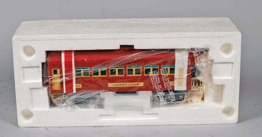 Lionel Classics No. 325 Observation Train Car: Red with brass steps, cream colored window frames and opening doors. Stock no. 6-13402 in original box. Condition (Near mint plus). Size 19" x 8-1/2" x 7"