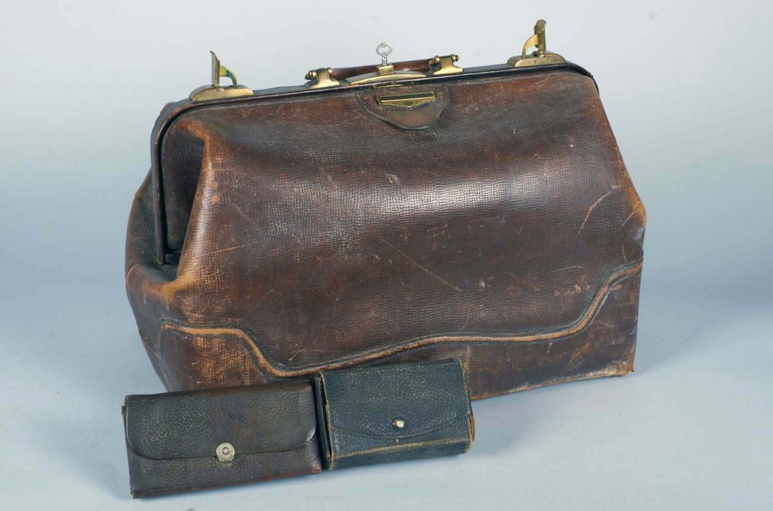 Lot Of 3: Medical Supplies: Including 1 - D&W medical leather bag with lock and key, 1 - Dr. Rogers Tycos sphygmomanometer manufactured by the Taylor Instrument Companies of Rochester, New York. In original case. and 1 - leather