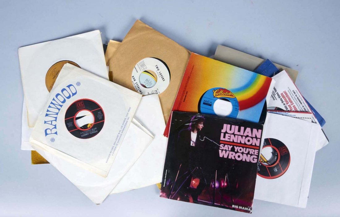 Lot of 28: Assorted 45 RPM Records: Including Strawberry Alarm Clock - Incense & Peppermints, Michael Jackson - Rock With You, Dion - The Wanderer, The Doors - LA Woman, Richie Valens - La Bamba, The Drifters, etc. Condition (Good).