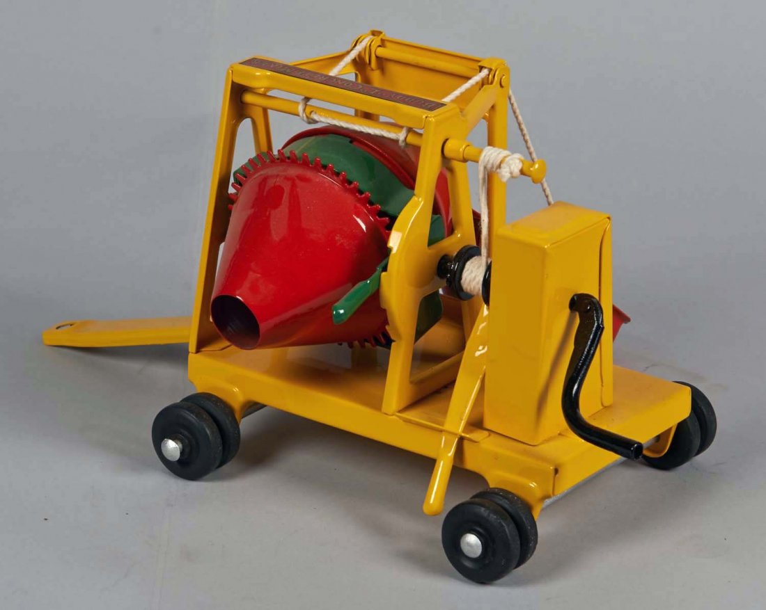 Pressed Steel Buddy L Concrete Mixer: Restored in yellow with black turning crank and red/green mixer. Condition (Restored). Size 8-1/2" L.