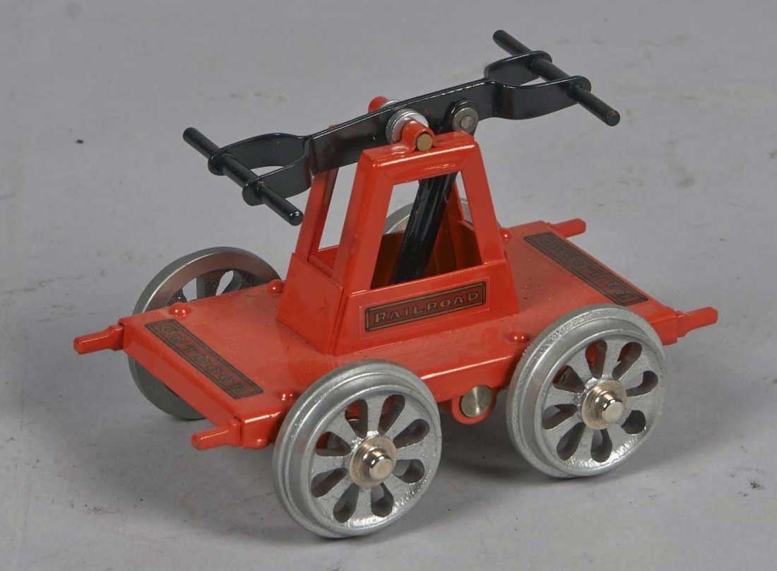 Pressed Steel Buddy L Outdoor Railroad Hand Car: Completely restored in orange with red and gold decals, silver wheels and black handle. Contemporary. Condition (Restored). Size 6-1/2" x 4" x 4-1/2"