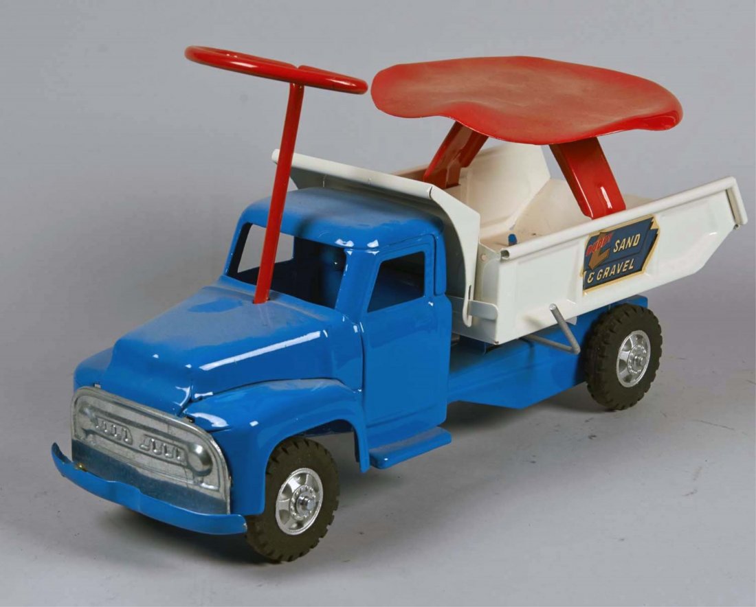Pressed Steel Buddy L Riding Sand & Gravel Truck: Restored with red seat and steering handle. Blue cab with white rear bed. Condition (Restored). Size 19" L.