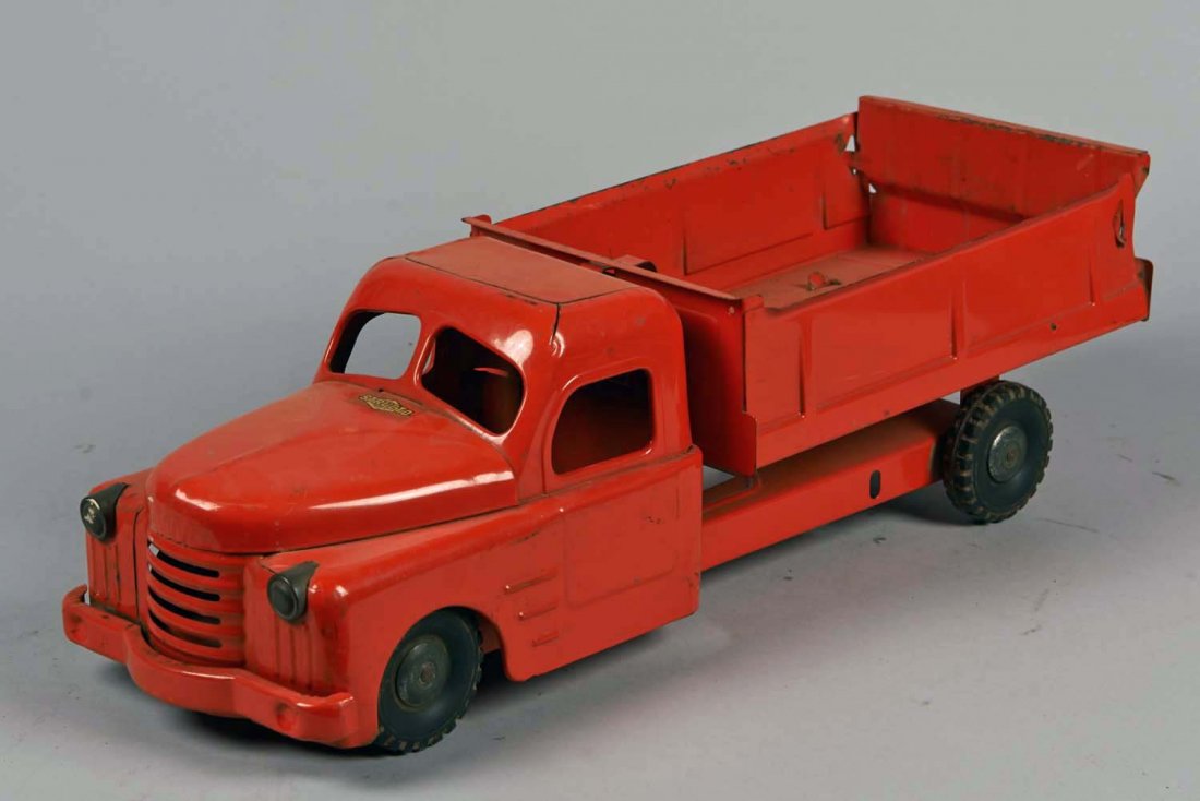 Pressed Steel Structo Orange Dump Truck: Condition (Very good). Size 19" L.