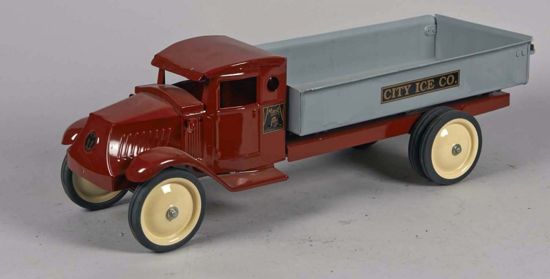 Pressed Steel City Ice Co. Truck: Red Mack tractor with grey trailer and 6 white wheels with rubber tires. Condition (Restored). Size 24" L.