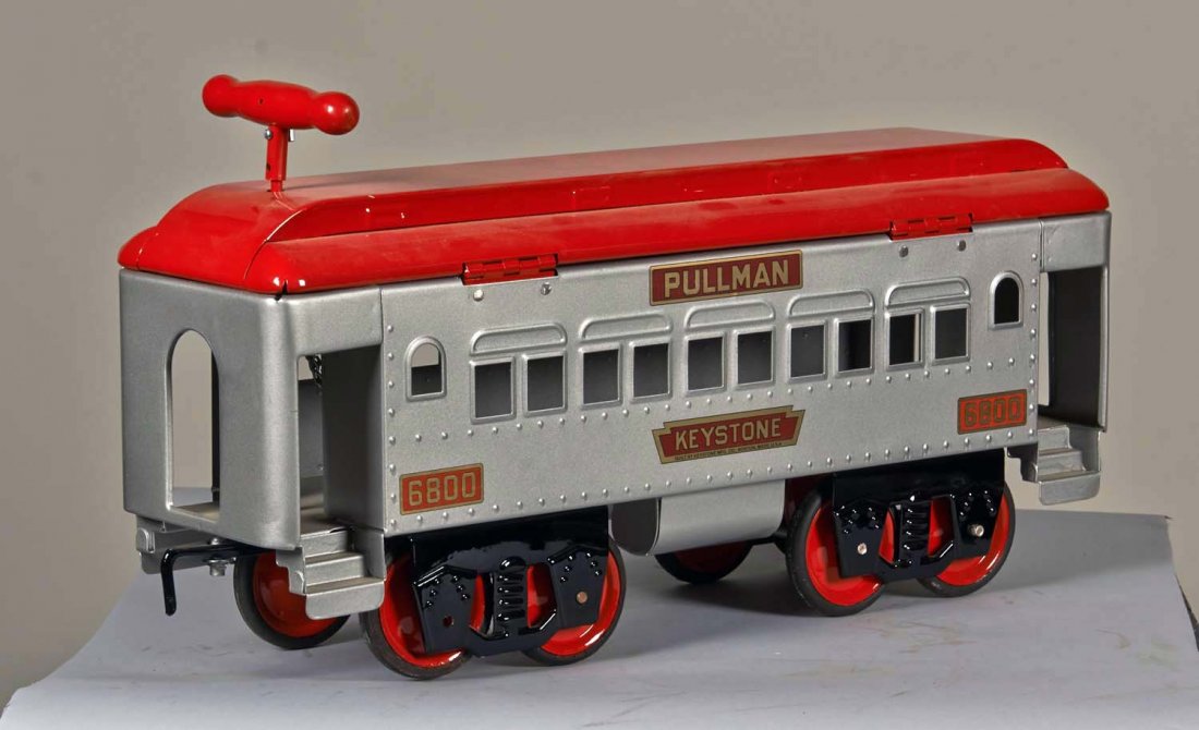 Pressed Steel Keystone 6800 Pullman Ride 'Em Toy: Restored in grey with red top and steering handle. Condition (Restored). Size 25" L.