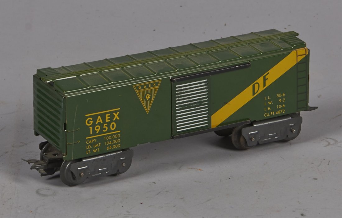 Gaex 1950 Box Car: Green with yellow lettering and 2 opening side doors. Condition (Very good). Size 7-3/4" x 2-1/8" x 3"