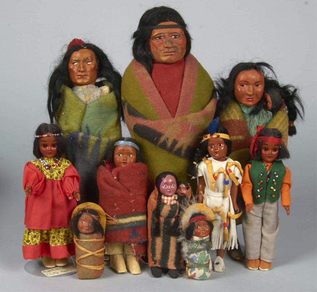 Lot Of 16 Vintage Native American Items and Toys: Including 2- Antique Male Indian dolls in blankets, 3- Antique Boy or Girl infants in various styles of Papooses, 3 - Mother and infants- two in blanket, the one in the dress is the newest c. 1960's a