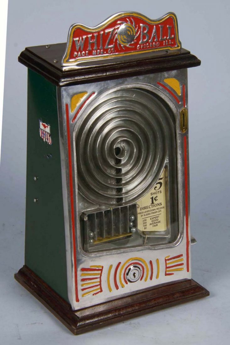 1 Cent Pace Whiz Ball Countertop Amusement Game: Flip ball skill game features spiral playing field. Front and marquee are new and includes keys.