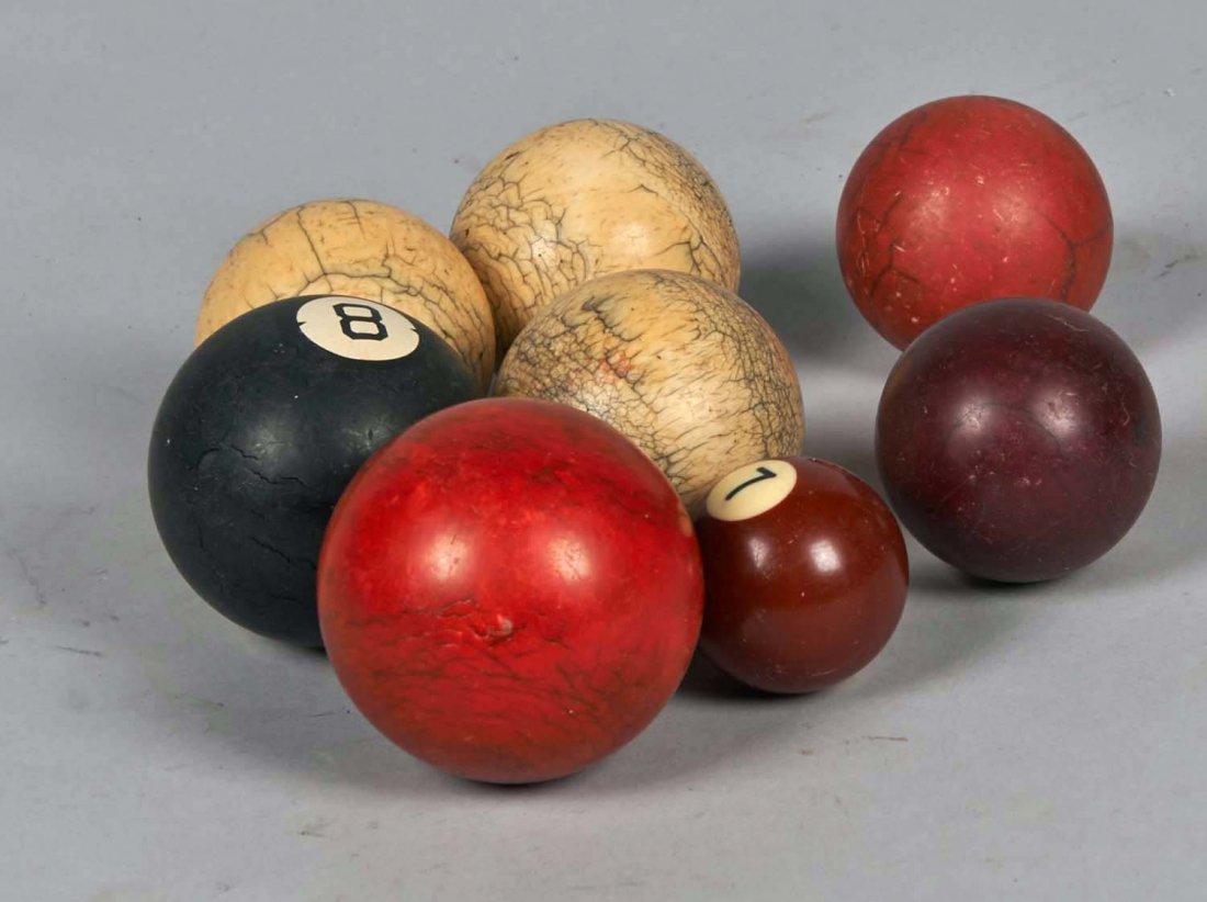 Lot Of 11 Early Billiards Pool Balls: Various assorted sizes, colors & materials (1 eight ball, 1 miniature seven ball, etc.), Some are ivory, Includes a full set of carom billiards balls in excellent condition in box, Some others may be 