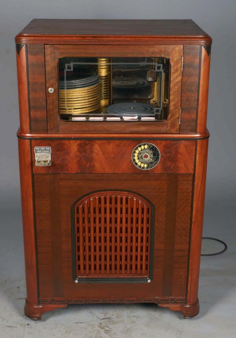 Multi-Coin Simplex Wurlitzer Jukebox Model 10: Dime and nickel operated Wurlitzer Simplex Phonograph, serial no. 2889 circa 1934. Jukebox plays 78 rpm records, offers ten selections, and has keys. In working condition. Condition (Excellent). Size 
