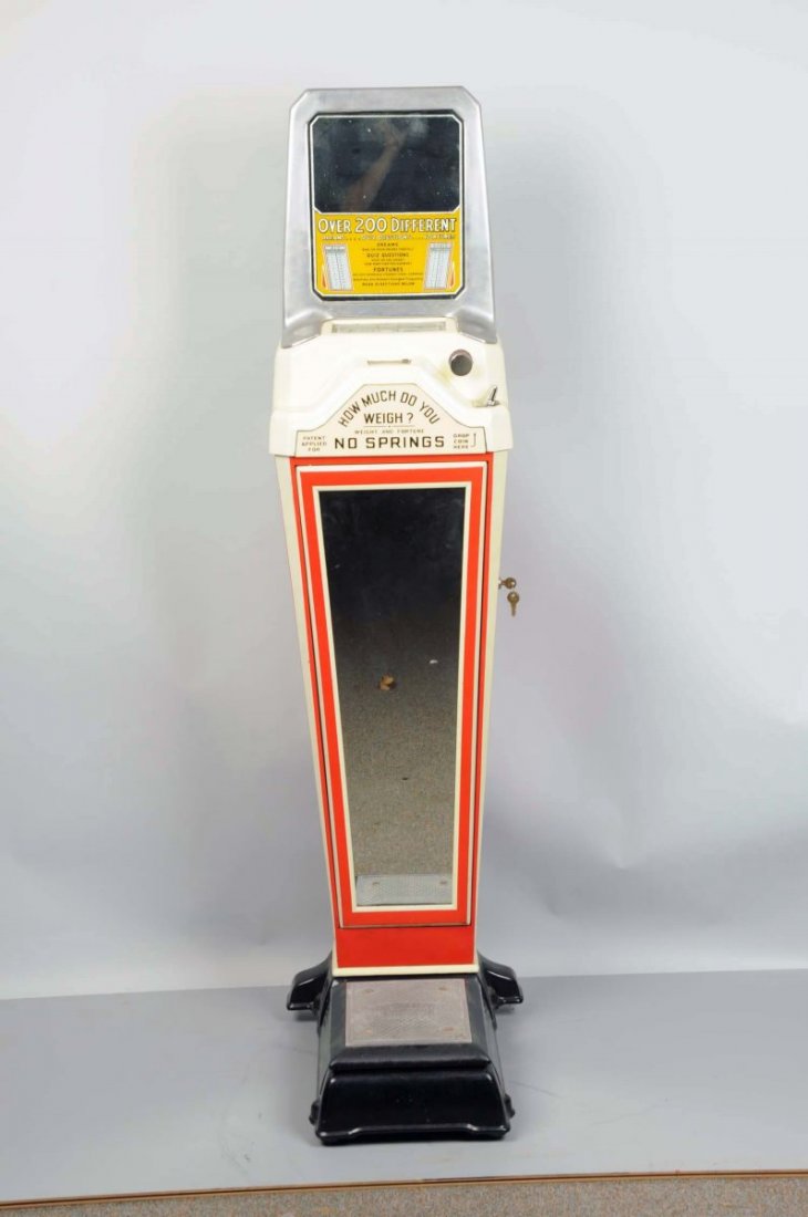 Coin-Op Watling Scale Co. Fortune Floor Scale: Porcelain enameled beige, red, and black stand with foil effect reverse on glass top sign and mirrored lower. Top sign reads "Over 200 dreams...quiz questions...fortunes" and includes male and female