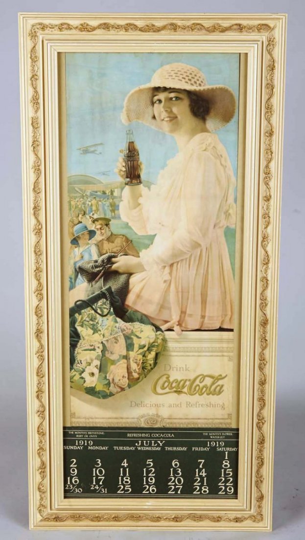 Coca Cola 1919 Litho Advertising Calendar: In frame. Featuring pretty lady with WWI airmen and biplanes. Month of July date pad page showing. Condition (Very good). Size 17" x 35"