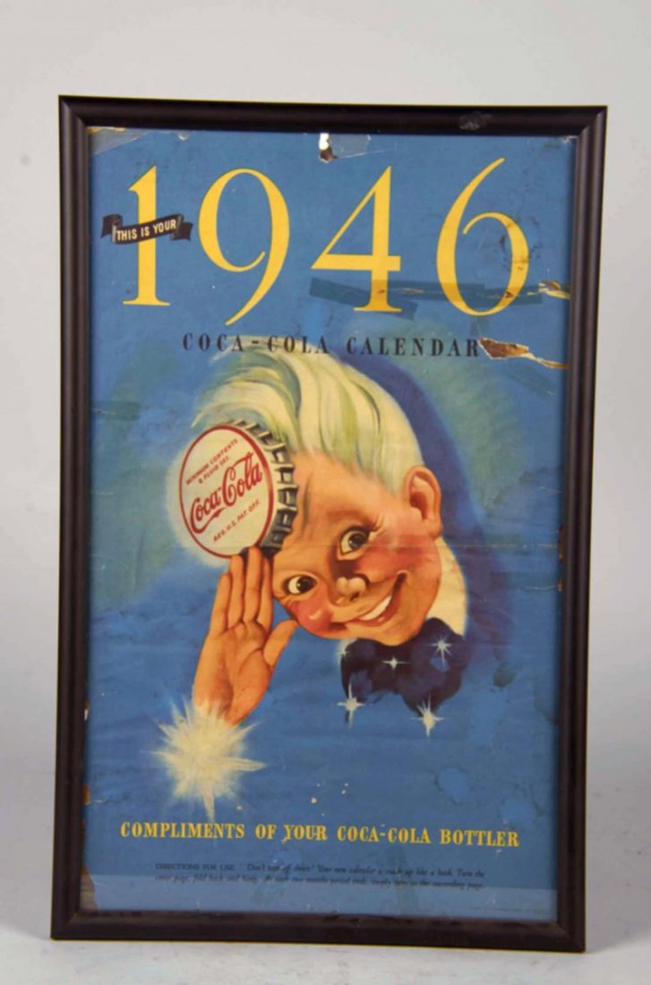 Sprite Boy Coca Cola Advertisement Calendar: 1946 Coke calendar is in frame and shows some paper loss. Condition (Fair). Size 14" x 22"