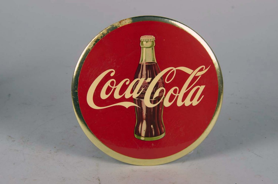 Coke Celluloid Easel Back Button Advertising Sign: Flat button sign with cardboard easel back and string for easy display shows the iconic Coke bottle circa 1950's. Condition (Very good). Size 9"