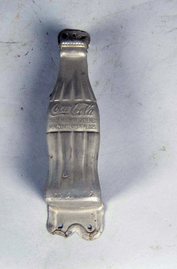 Coca Cola Bottle Shaped Advertising Door Handle: Metal door pull handle in the shape of a 6 ounce bottle, circa 1930's. Condition (Good). Size 8" tall