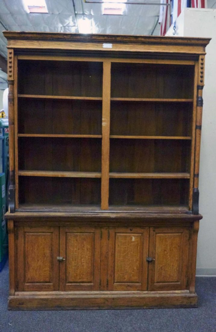 Brunswick Balke Collender Co. Wood Display: Cabinet features 4 lower opening doors, antiqued pillars, top plaque reads "Billiards & Pool Tables - Bank Office & Saloon Fixtures".