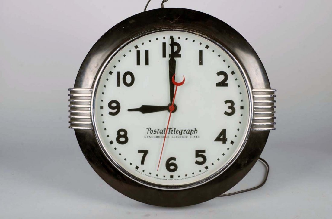 Postal Telegraph Electric Light-Up Clock: Art Deco styled illuminated clock. Model Postal SI 15 and manufactured by Hammond Instrument Co. Face reads, "Postal Telegraph Synchronous Electric Time". Clock does not work. Circa 1950s. Condition (