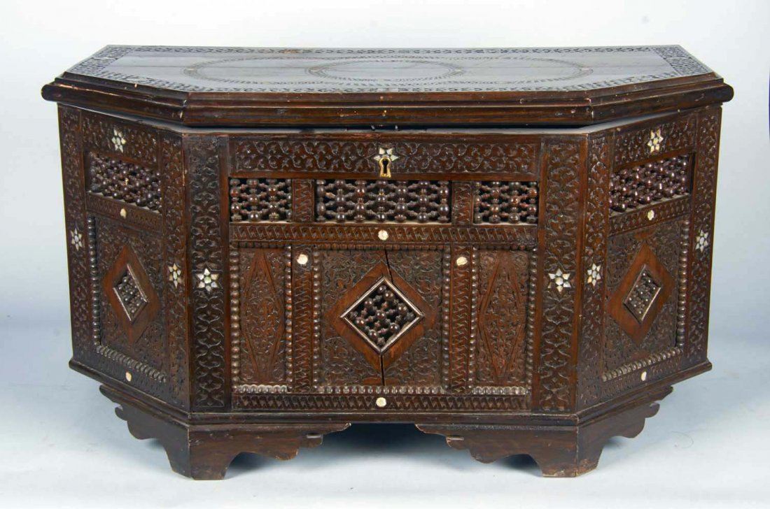 Middle Eastern Style Carved Wood Hexagon Chest: Ornate Middle Eastern Style Carved Wood Hexagon-Shaped Chest w/ Mother Of Pearl Star Inlay, Has fancy circle & stick & ball detail Condition Very Good Size 56" x 16" x 12.5"