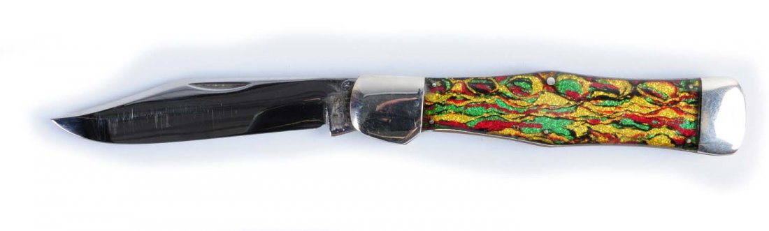 Case Folding Knife.: Case Tested XX 5 - 1/4" Swell center folding hunter handled in Christmas tree celluloid. Blade is not original to the knife and shows a weld repair and grind work to the kick. Handles are perfect with