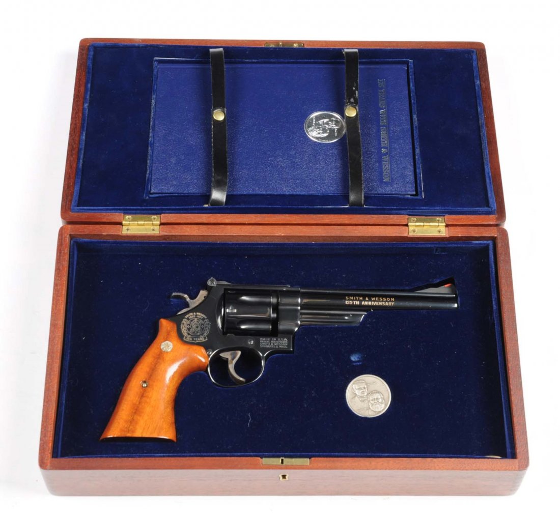 MIB S&W 125th Anniversary Comm. Revolver.**: Serial # 5143 This revolver was issued in 1977 to commemorate the 125th anniversary of the Smith & Wesson founding. It is a Model 25-3 in .45 caliber with a 6-1/2" barrel, double action, smooth silver