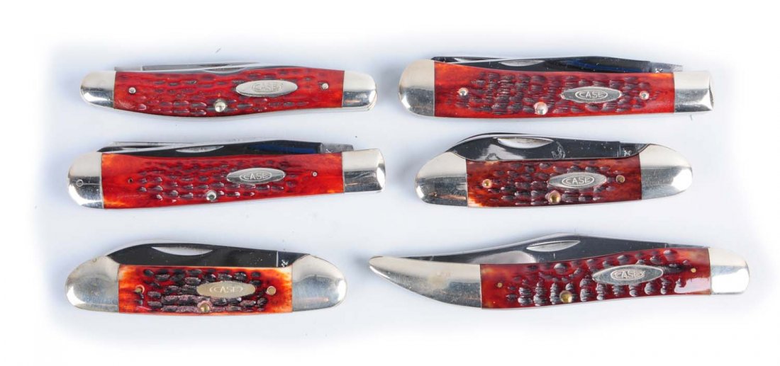 Lot of 6: Case Knives.: Lot includes: Case XX U.S.A 4 - 1/8" No. 6254 two-blade "Trapper" handled in red bone. Circa 1975, a Case XX U.S.A. 5" No. 61093 one-blade "Texas Toothpick" handled in red bone. Circa 1970, a Case XX