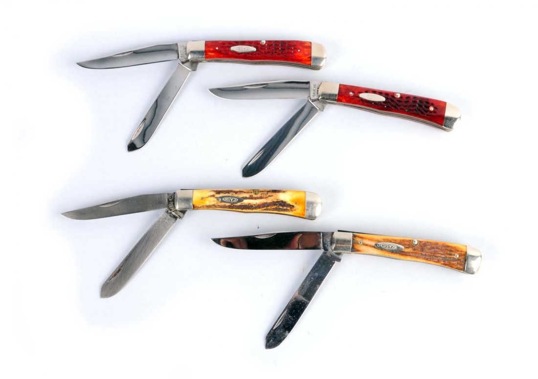 Lot of 4: Case Knives.: Lot includes: a Case XX U.S.A 4 - 1/8" No 6254 two-blade red bone "trapper" Circa 1975, a Case XX U.S.A No. 6254 two-blade red bone "Trapper". Circa 1975, a Case XX U.S.A 4 - 1/8" No. 5254 two-blade "