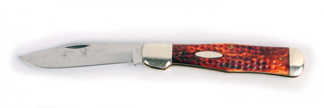Case Folding Knife.: Case XX 5 - 3/8" No. C61050 SAB one-blade folding hunter handled in red bone. Handles are perfect without cracks or chips. Blade has full snap in both open and close direction. Circa 1940 - 1964. Cond