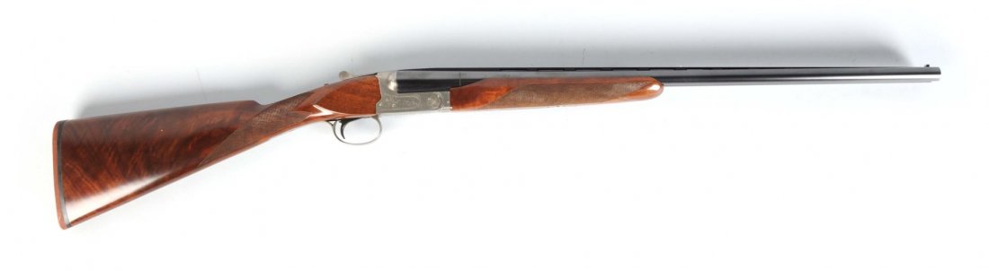 Winchester Mod 23 XTR Pigeon 20 Ga. Shotgun**: Serial # PWK20692 20 gauge side-by-side shotgun. Barrel Length: 25.5". Chamber Length: 3". Length of Pull: 14-3/8". Drop on the Heel: 2-1/4". Right choke is improved cylinder while the left choke is m
