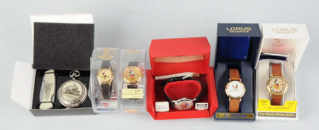 Lot Of 6: Walt Disney & Mickey Train Watches.: More contemporary. All in original boxes, most work, sold as is. 1980's and newer. There is a Helbros Goofy, a train commemorative set that shows a pocket watch and a matching pocket knife, one Minnie