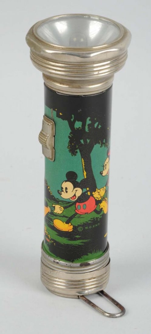 Lot Of 4: Wooden Mickey & Minnie & Tin Flashlight: Lot includes: two Minnie mouse and one Mickey Mouse wooden toys and a tin flashlight. One of the Minnie is missing wooden part of the hand, the lower part of the legs and feet. The Mickey is missing h