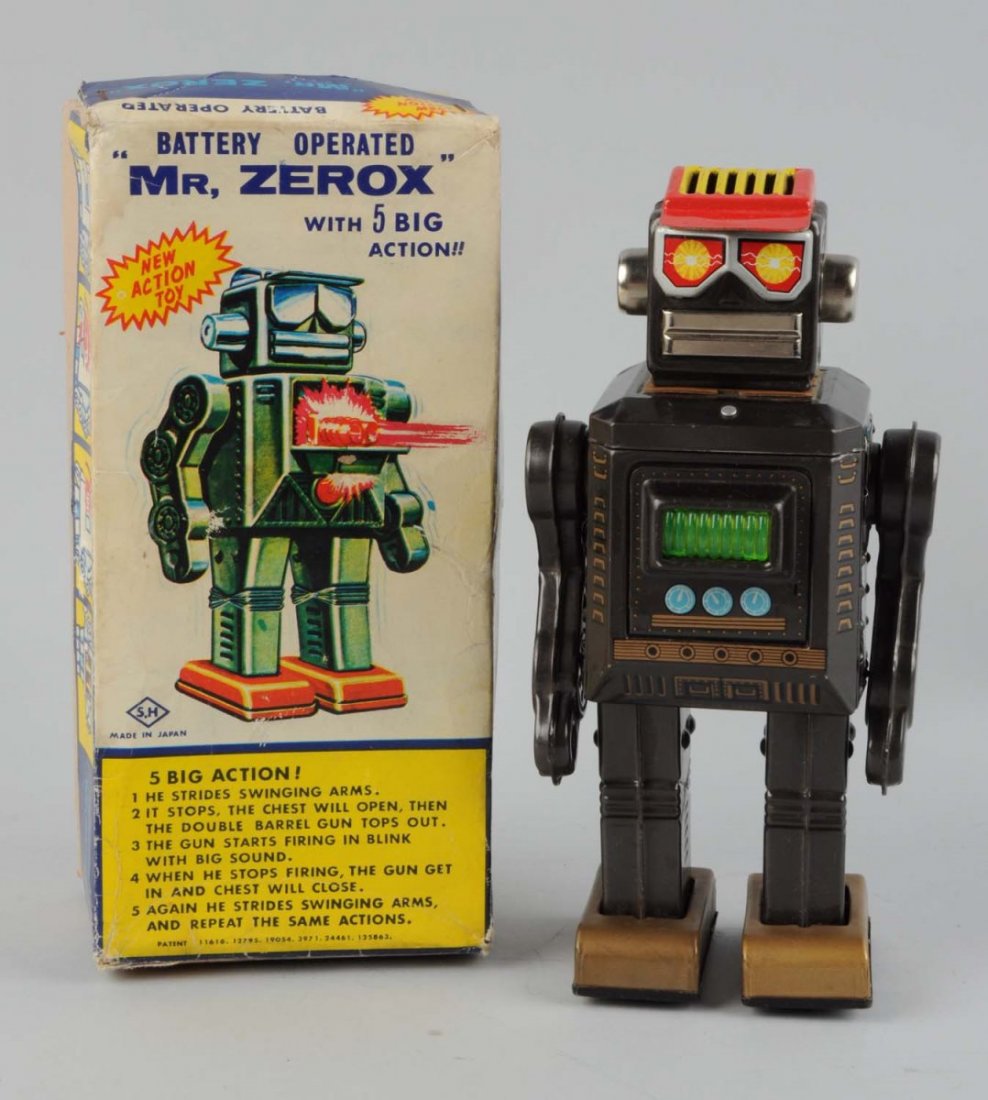 Japanese Tin Battery - Operated Mr. Zerox.: Includes original box, has some creasing, small paper pulls and tiny tears. Tin litho is in very good condition. Some scratches mainly toward the back of the robots head. All original. Battery compart