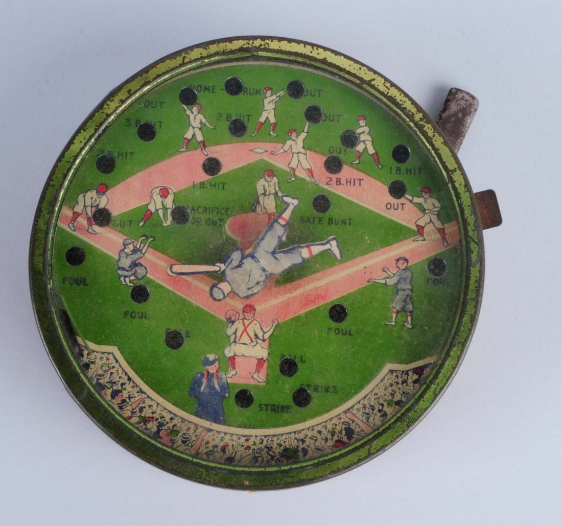 Mini Baseball Pinball Machine.: Lever operated which have oxidation on them. Has a clear plastic top and a tin bottom. Cardboard sides have paper loss and scratching. Condition (Good - Very Good). Size 5" Dia.