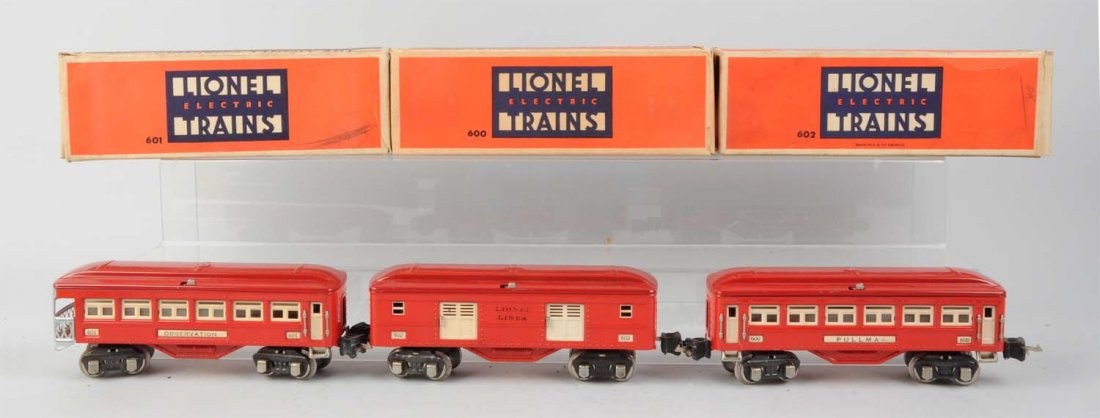 Lionel 600,601,602 Passenger Car Set.: 600 pullman car very clean and attractive. 602 Baggage car complete and all original, has a few scratches, mostly on one side. Very clean, no rust. Excellent condition. 691 observation car, complete a