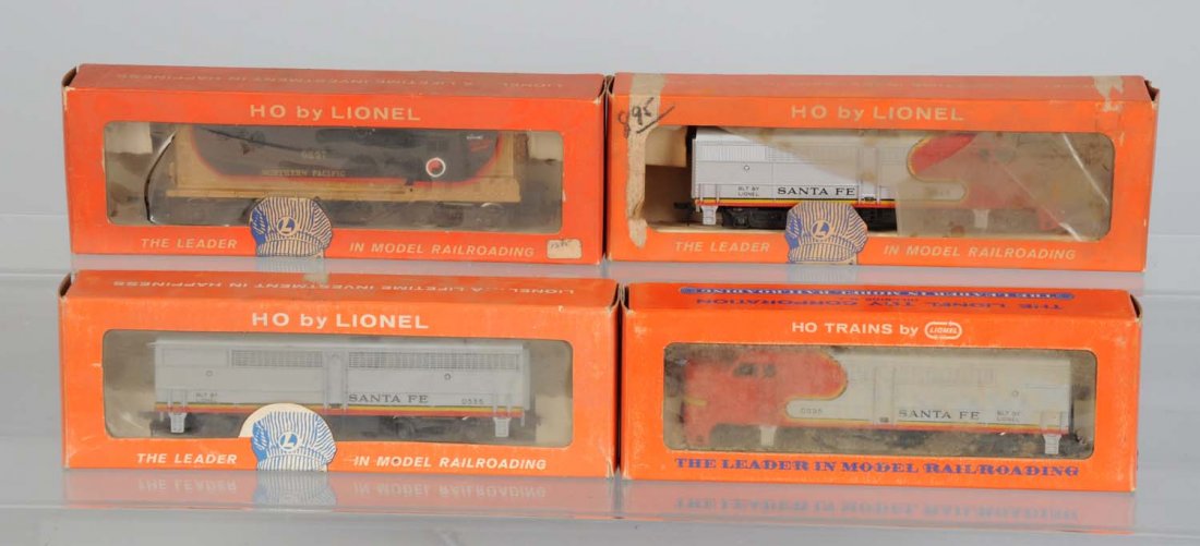 Lionel HO 0597 Northern Pacific & 3 S.F. Diesels.: Locomotive is complete in like new condition and comes with original instruction sheet and box. 0565 Santa Fe Alco A unit is complete like new in original box with original instruction sheet. 0535W Sa