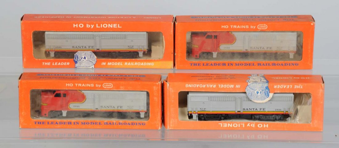 Lot of 4: Lionel Assorted Santa Fe Diesels.: 0595 Santa Fe powered A unit is complete like new in good, square, original box with original warranty. 0535 B unit with horn has one truck broken off frame, but is otherwise complete in like new cond