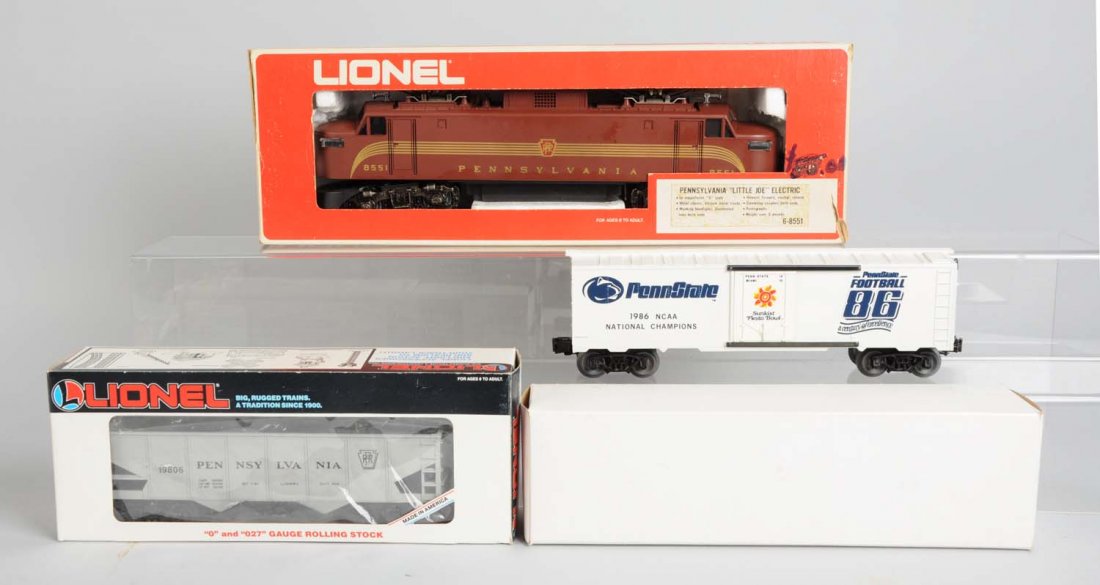 Lot of 3: Lionel 8551 PRR EP5 & Two Freights.: Lot includes: 8551 PRR EP5, box is worn and discolored. Locomotive is complete like new and in original box. Lionel 19806 operating hopper, like new and in original box. And a KMT Penn State box car, 