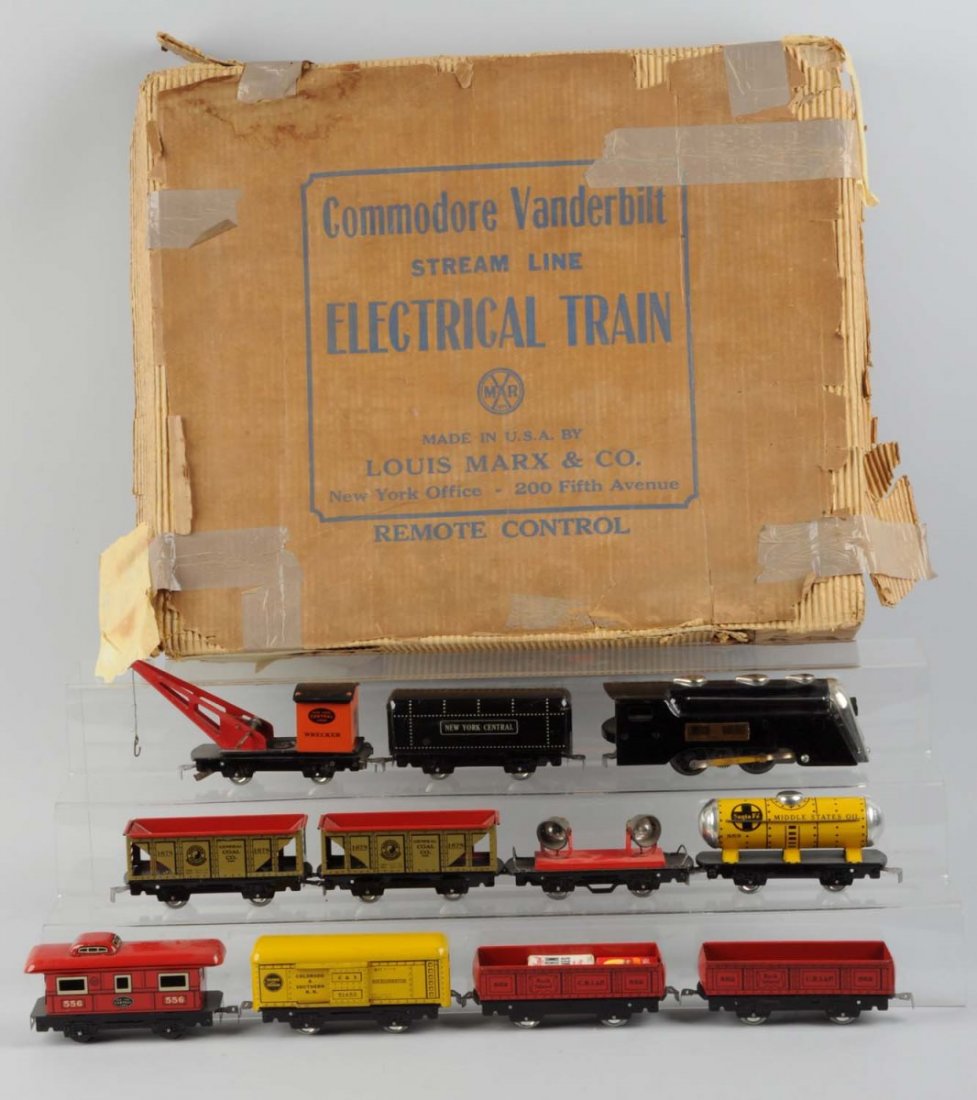 Marx Pre-War Commodore Vanderbilt 10 Pc. Box Set.: Set consists of one Marx commodore Vanderbilt black and chrome steam loco with some scratches. 550 wrecker with track clamp that is usually missing. 551 tender complete and all original with minor scr